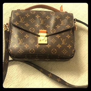 gently used Louis Vuitton